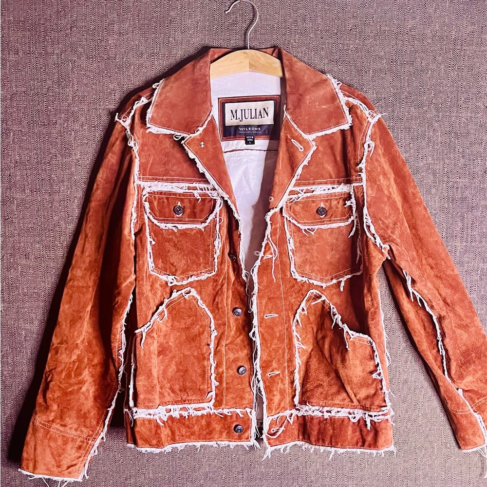 Men’s vintage fashion suede leather jacket w fringe edges.